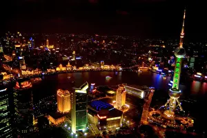 Sky Scraper Prints: Shanghai China wonderful skyline with modern skyscrapers by river at night from above