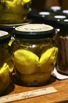 In the shop: Glass jars with goat cheese chevre in olive oil. Moulin Mas des Barres olive mill
