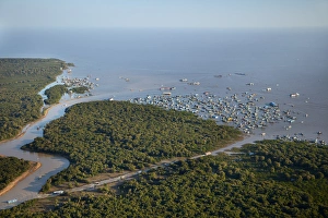 Cambodia Collection: Siem Reap River, Chong Khneas Floating Village, and Tonle Sap Lake, near Siem Reap