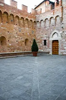 Inti St Clair Prints: Sienna, Tuscany, Italy - The courtyard of an old world building with a single potted