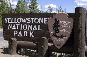 A sign at west entrance to Yellowstone National Park, Wyoming