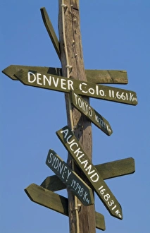 Sydney Prints: Signage of different cities at Oia, Santorini Greece