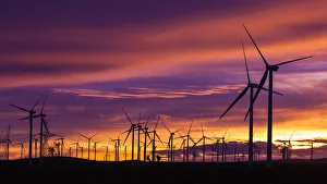 Images Dated 25th December 2012: Silhouetted wind turbines at sunset, Mojave, California, USA
