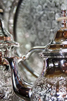Glass Prints: Silver teapot in metalworking shop, Fes, Morocco
