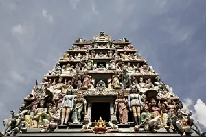 Singapore. Hindu Religious figures decorating the entrance of Sri Mariamman Temple