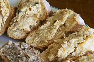 Slices of bread with preparations from sturgeon: pate with green pepper, pate with