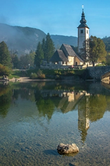 Steeple Prints: Slovenia, Bled, Lake Bled. Church reflects in lake