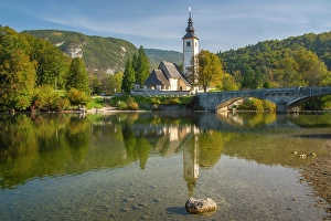 Steeple Prints: Slovenia, Bled, Lake Bled. Church reflects in lake