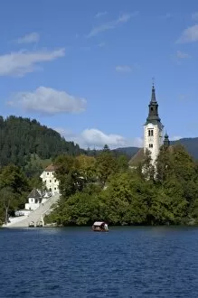 Images Dated 26th September 2004: Slovenia, Bled, Lake Bled, pletna boat and Bled Island stairs