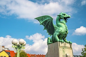 Slovenia Prints: Slovenia, Ljubljana. Statue on Dragon Bridge