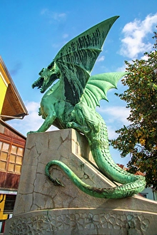 Slovenia Prints: Slovenia, Ljubljana. Statue on Dragon Bridge