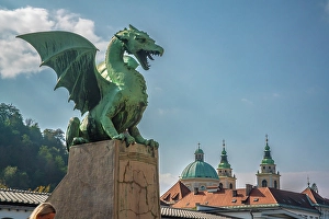 Slovenia Prints: Slovenia, Ljubljana. Statue on Dragon Bridge