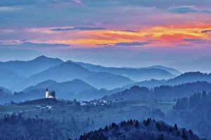 Hollice Looney Prints: Slovenia, Poljane Sora Valley, hillside church near Gorenja Vas in early morning light