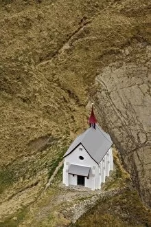 Small church viewed from atop Pilatus Mountain, near Lucerne, Switzerland