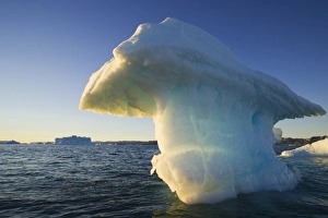 Midnight Sun Prints: Small iceberg drifting in Disko Bay, midnight, end of June, mid summer night