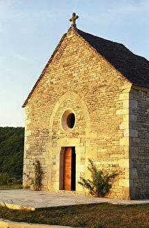 A small medieval chapel in the Burgundy village Salmaise at sunset