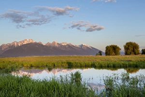 Mission Valley Prints: Small pond reflects the Mission Mountains at the Ninepipe WMA in the Mission Valley