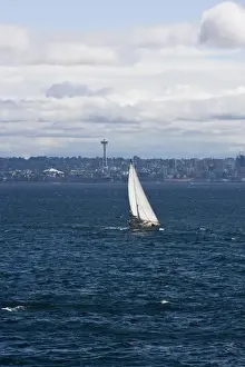 Space Needle Prints: A small sailboat is propelled by a strong burst of wind off the coast of Seattle