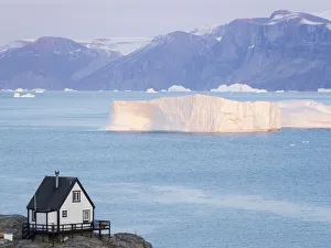 Images Dated 2017 August: Small town of Uummannaq and glaciated Nuussuaq Peninsula in the background. Greenland