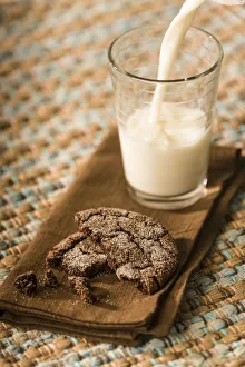 Sweet Prints: Snack of a homemade chocolate sugar cookie, with milk being poured into a glass