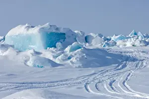 Point Barrow Prints: snow machine tracks through jumbled up ice in the frozen Chuckchi Sea during spring whaling season