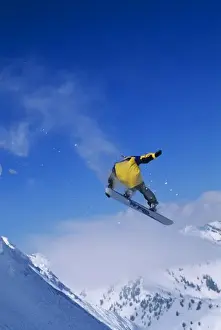 Precarious Prints: Snowboarding in Grizzly Gulch, Little Cottonwood Canyon, Wasatch Mountains, Utah. (MR)