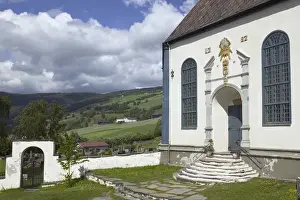 Sofar Fron octagonal stone church 1792 over looks Laggen River river valley, Ringebu