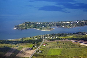 Viti Levu Prints: Sonaisali Island Resort, and farmland, near Nadi, Viti Levu, Fiji, South Pacific - aerial