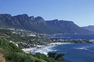 South Africa, Cape Town, Afternoon sun lights Camps Bay and Twelve Apostles mountains
