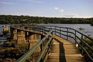 Iguacu Prints: South America, Argentina, Iguacu Falls. A boardwalk stretches out across the top