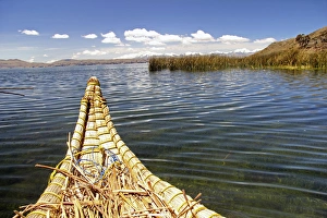 Images Dated 21st October 2011: South America, Bolivia, Lake Titicaca. Reed boat of Uros floating reed islands of