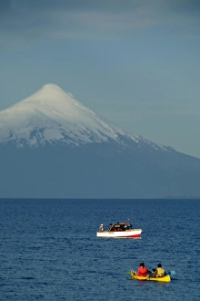 Boating Prints: South America, Chile, Puerto Varas. Boats on Llanquihue Lake with the Osorno Volcano