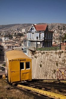Images Dated 16th March 2009: South America, Chile, Valparaiso. A tram rises up Artillery Hill. (UNESCO World Heritage