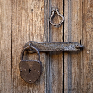 South America, Mexico, San Miguel de Allende. Detail of a door with antique padlock