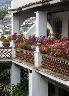 Images Dated 14th January 2009: South America, Mexico, Taxco. Close-up of a home with other houses on hillside. Credit as