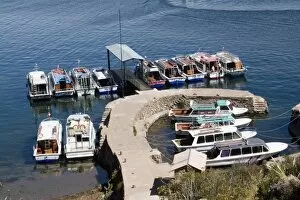 South America - Peru. Boats at the dock at Taquile Island on Lake Titicaca