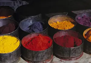 South America, Peru, Huaylas. Pots of dye offer the shopper a variety of colors