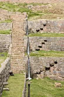 South America - Peru. Inca site of Tipon with terracing and irrigation system lies