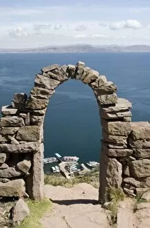 South America - Peru. Stone archway and path to the dock at Taquile Island on Lake Titicaca