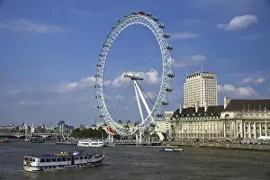 The South Bank of London showing the London Eye and County Hall along the Thames