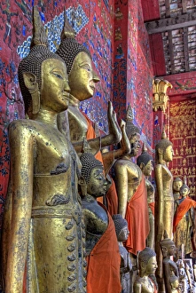 Luang Prabang Prints: Southeast Asia, Laos, Luang Prabang. Statues of Buddha inside Buddhist temple. Credit as