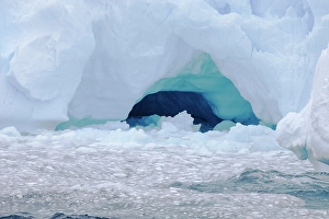 Erosion Prints: Southern Ocean, Antarctica. Beautiful blue and purple colors in the ice are exposed by the erosion of the tabular berg