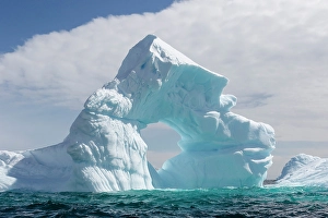 Center Prints: Southern Ocean, Antarctica. A beautifully eroded iceberg is aground near Hydrurga Rocks