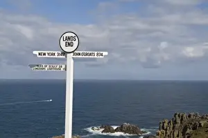 Cornwall Prints: Southernmost tip of England Lands End in Cornwall sign of distances on cliff