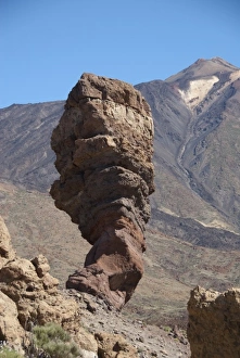 Spain, Canary Islands, Tenerife. Las Canadas National Park. Volcanic rock formation in front of Mt