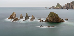 Sea Stack Prints: Spain, Gueirua. Sea stacks on shoreline
