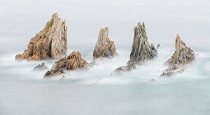 Sea Stack Prints: Spain, Gueirua. Sea stacks on shoreline