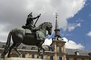 Madrid Prints: Spain, Madrid. Plaza Mayor, statue of King Philip III, bakers guild house (aka Casa