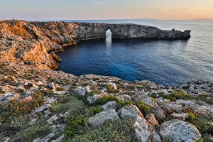 Images Dated 23rd August 2019: Spain, Menorca. Sunset at Pont d En Gil (natural arch)