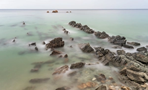 Formation Prints: Spain, Playa de Aguilar. Rock formations on ocean shore